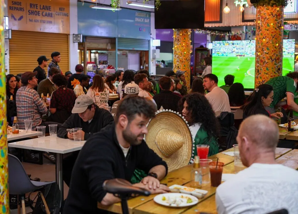A packed food hall at Rye Lane Market on match night